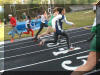 Anna Walker, start of 100M Conference Championship Race. In Green, in middle, she won!